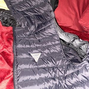 L Black Guess vest. Never worn.